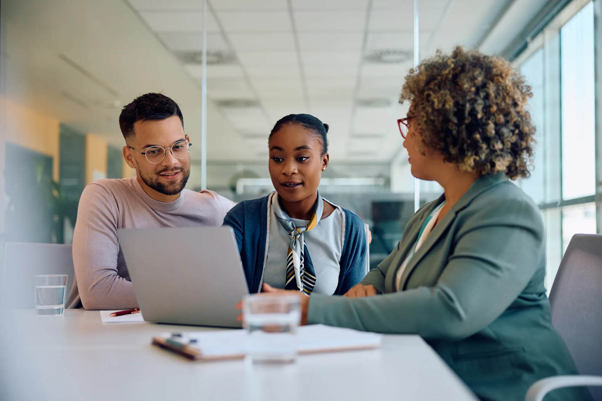 people talking to loan officer