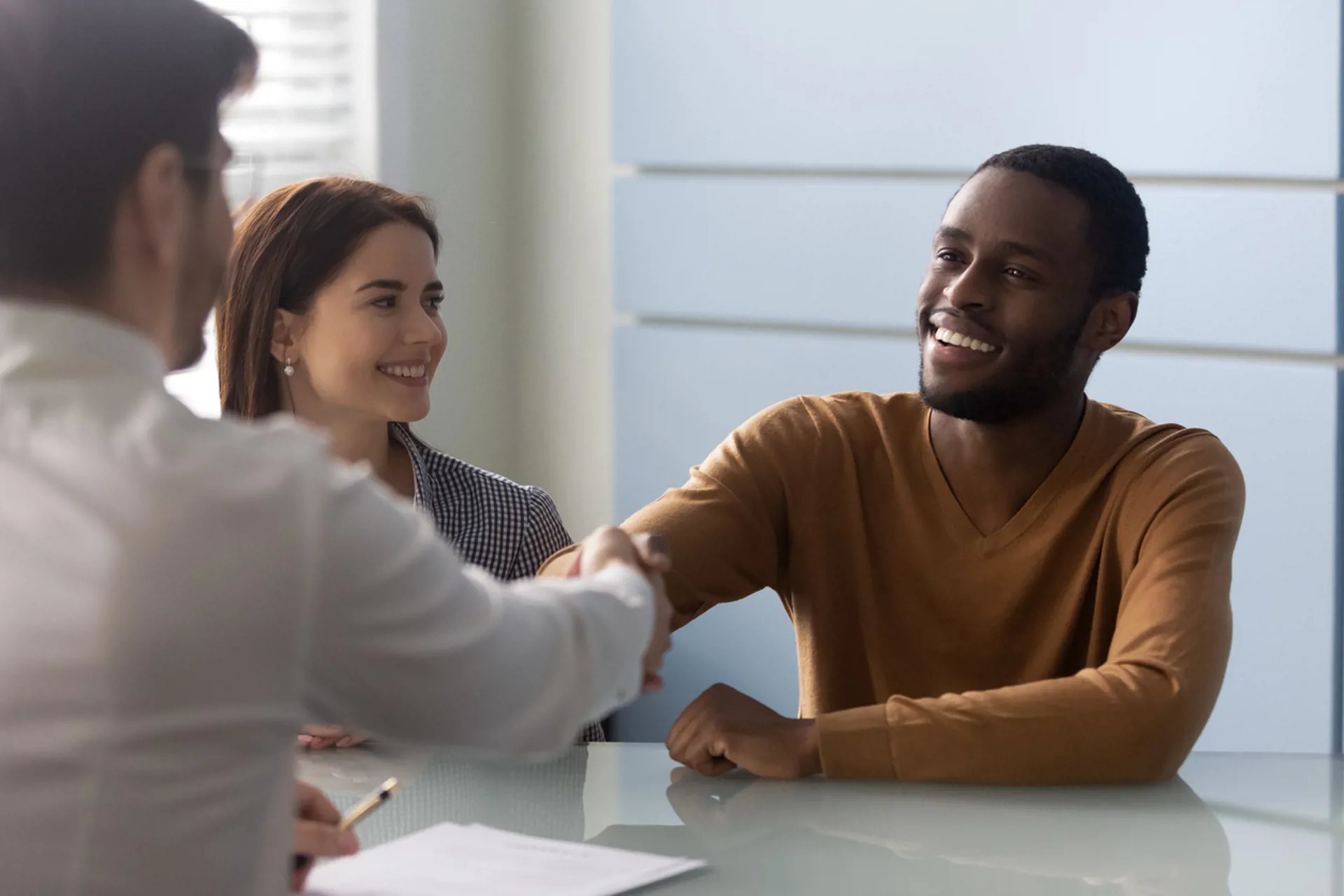 African American husband handshake close deal with Real Estate Agent