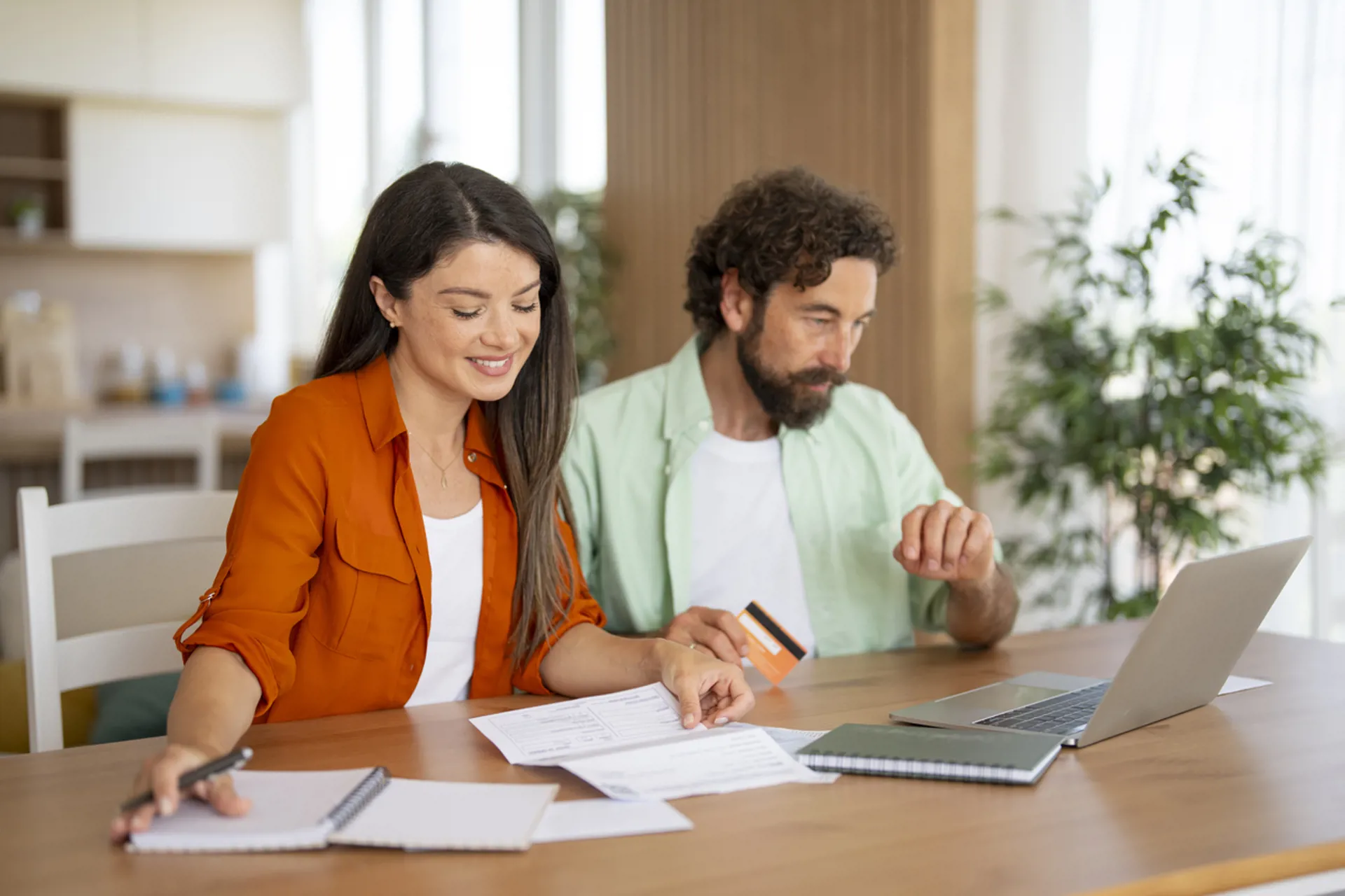 Couple managing home finances