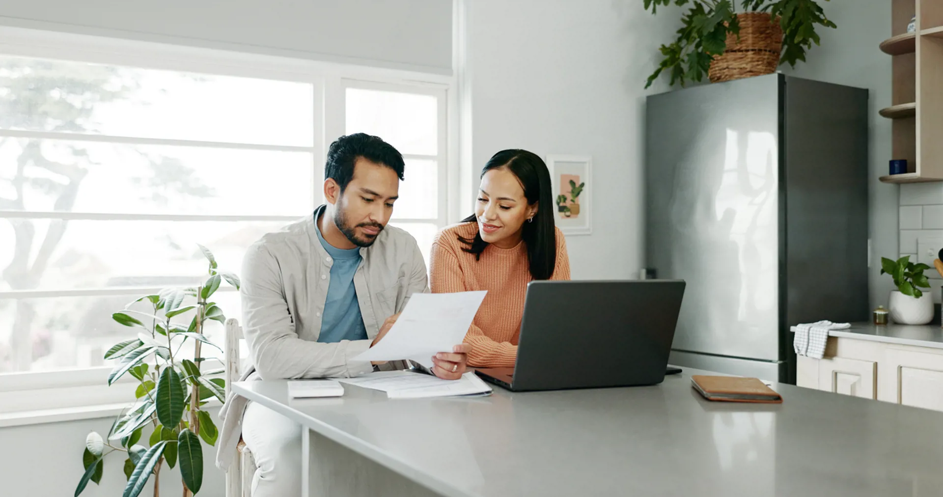 Kitchen, couple and conversation with document for finance