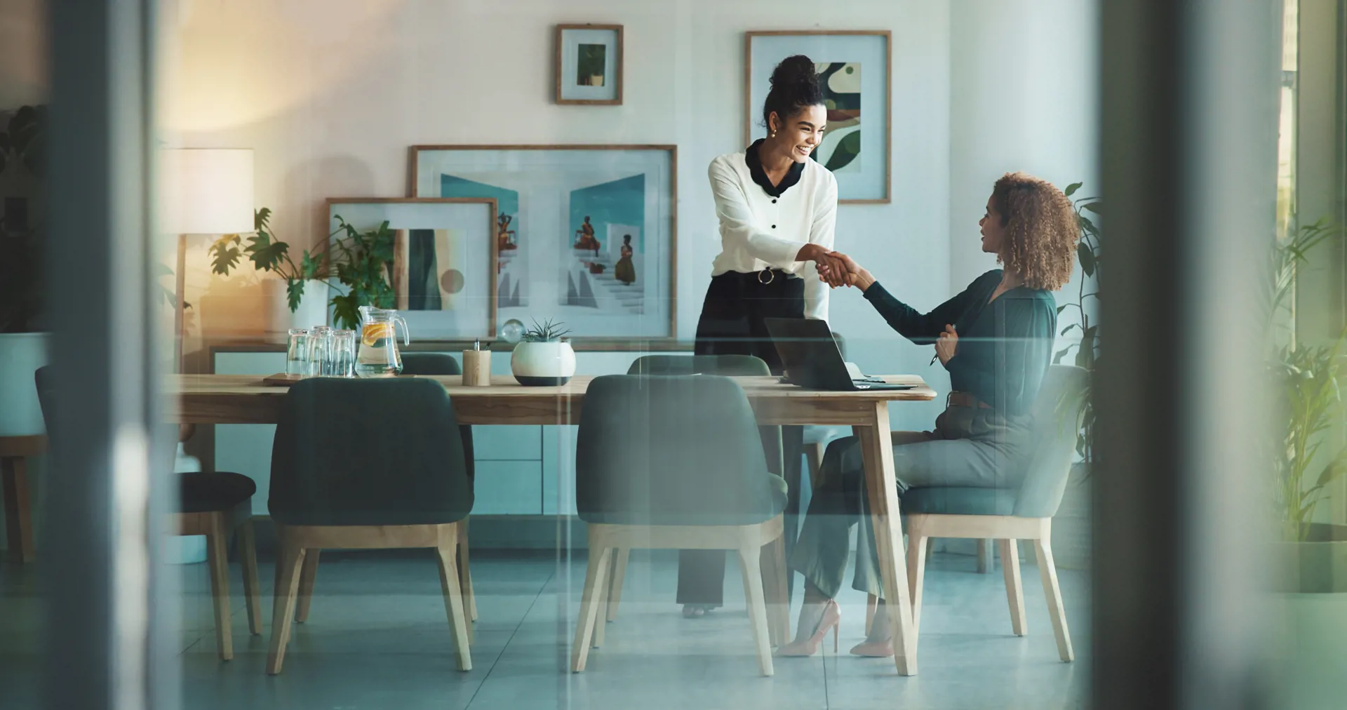 People in meeting at table in office