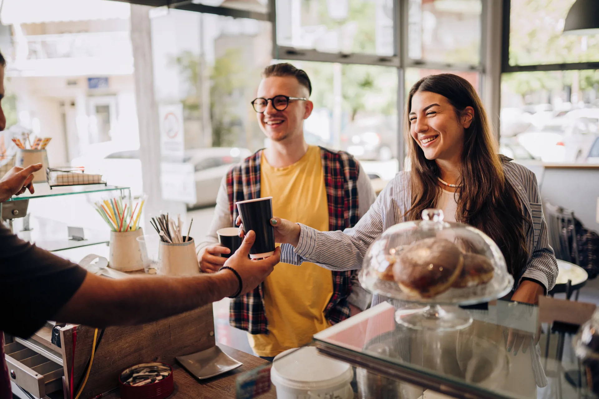 Happy people getting coffee