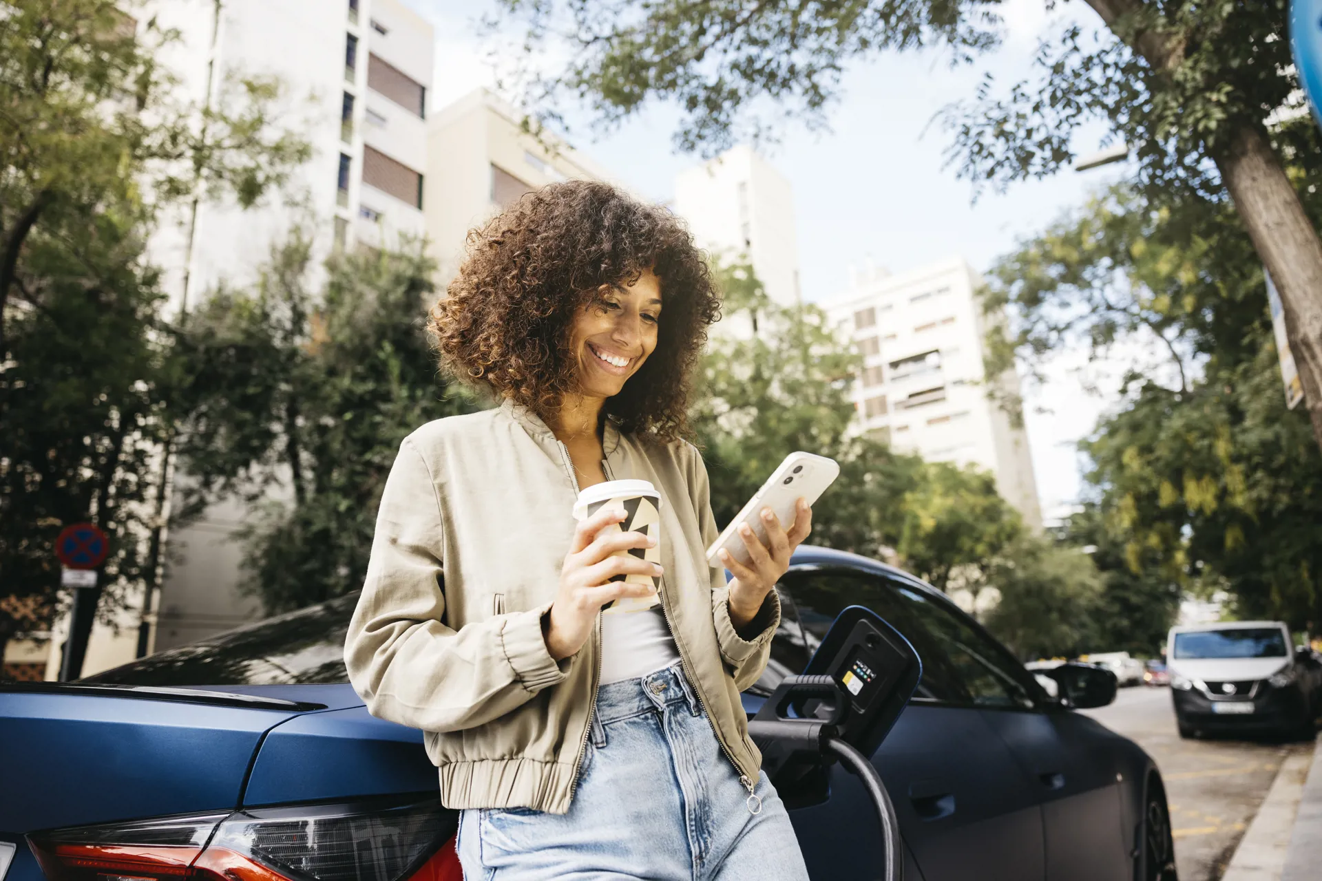 happy woman looking at phone